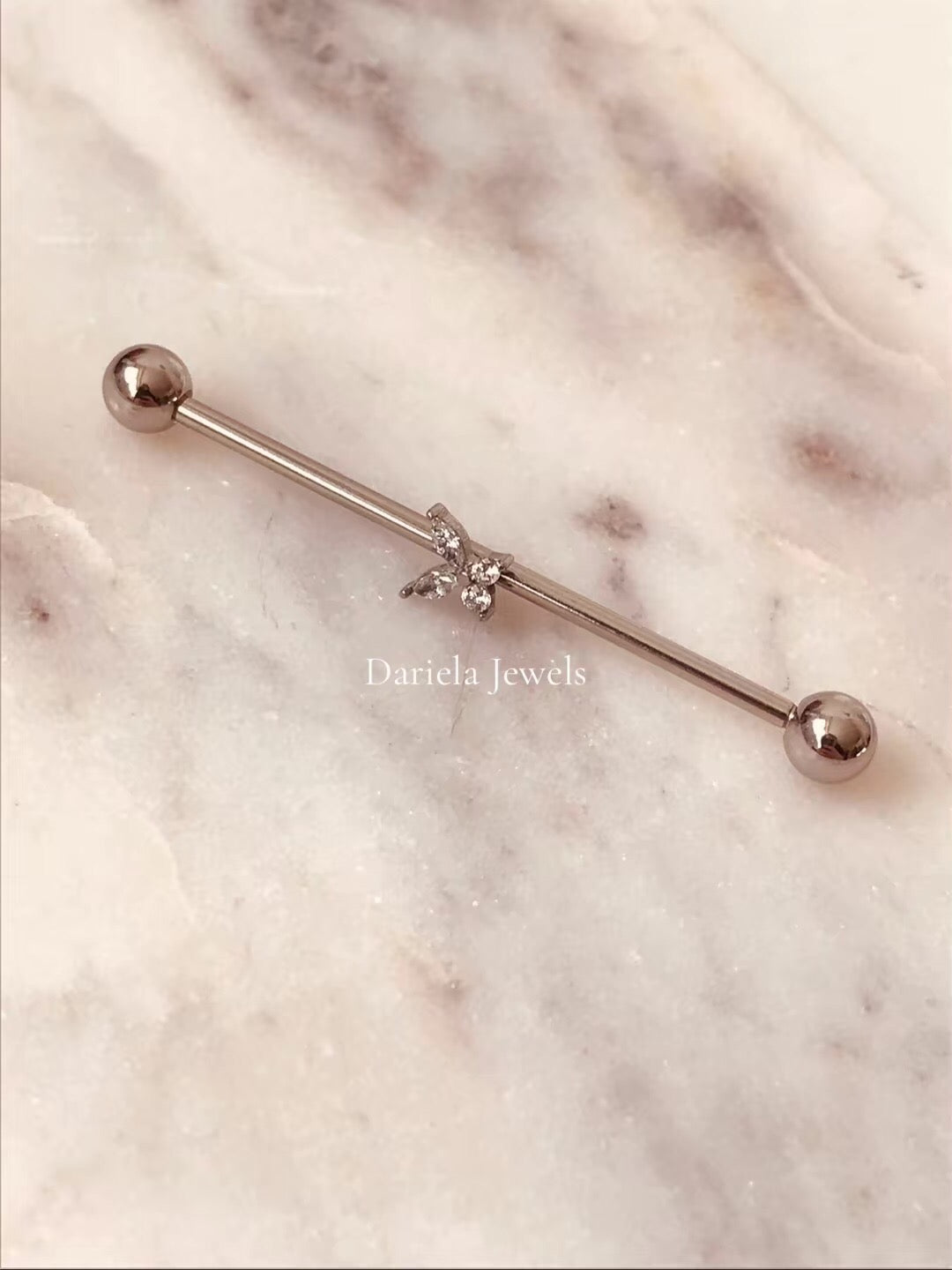 Piercing industriel oreille double zirconium rose Piercing industriel oreille double zirconium rose